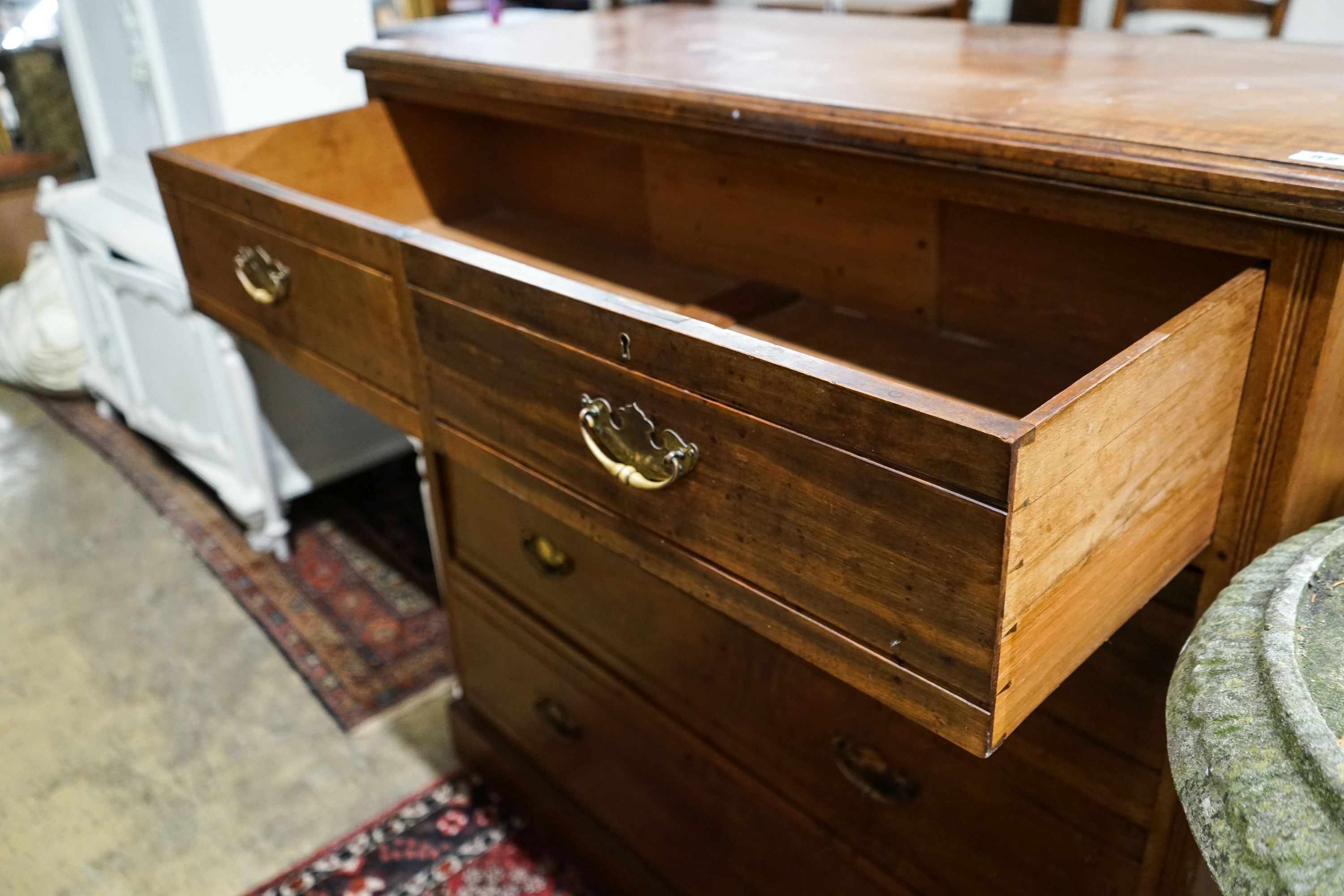 A late Victorian walnut chest of drawers, width 120cm, depth 52cm, height 118cm